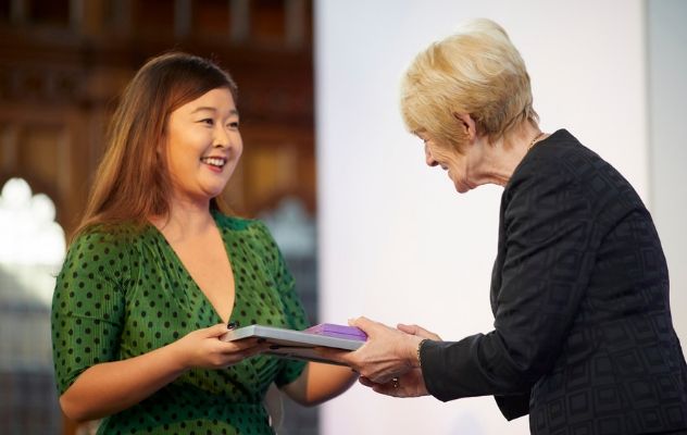 Natalie Cheung receiving the university of Manchester Alumni Volunteer of the Year award